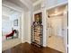Hallway with wine rack leading to rooms at 163 Villa Di Este Ter # 105, Lake Mary, FL 32746