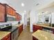 Features a modern kitchen with stainless steel appliances and granite countertops at 163 Villa Di Este Ter # 105, Lake Mary, FL 32746