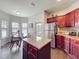 Bright eat-in kitchen features stainless steel appliances and granite countertops at 163 Villa Di Este Ter # 105, Lake Mary, FL 32746