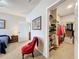 Comfortable main bedroom leading to walk-in closet, features en suite bathroom and ample storage at 163 Villa Di Este Ter # 105, Lake Mary, FL 32746