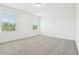Bedroom with neutral carpet, bright windows, and lots of sunlight at 16391 Bird Of Paradise Ave, Clermont, FL 34714