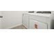Modern laundry area with new washer and dryer appliances at 16391 Bird Of Paradise Ave, Clermont, FL 34714
