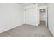 Bedroom with neutral carpet and large closet at 16399 Bird Of Paradise Ave, Clermont, FL 34714