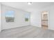 A light-filled bedroom with an en-suite bathroom provides a private and comfortable living space at 16399 Bird Of Paradise Ave, Clermont, FL 34714