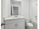 Bathroom featuring a vanity with white countertop and a shower-tub combination at 16466 Bird Of Paradise Ave, Clermont, FL 34714