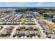 Scenic aerial view of a Primary-planned community with neatly arranged homes and lush green spaces at 16527 Sea Glass St, Winter Garden, FL 34787
