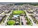 Impressive aerial view of a Gathering-friendly community with swimming pool, playground, and green spaces at 16527 Sea Glass St, Winter Garden, FL 34787