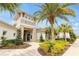 Exterior of community clubhouse with stone accents, lush landscaping, and a welcoming entrance at 16527 Sea Glass St, Winter Garden, FL 34787