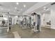 A modern community gym featuring state-of-the-art weight machines and equipment for a full body workout at 16527 Sea Glass St, Winter Garden, FL 34787