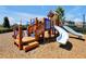 Community playground equipment featuring slides and climbing structures for ' entertainment and active play at 16527 Sea Glass St, Winter Garden, FL 34787