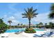 Serene view of the community pool, featuring clear water and ample lounging space at 16527 Sea Glass St, Winter Garden, FL 34787