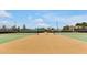 A well-maintained tennis court ready for a competitive match at 16527 Sea Glass St, Winter Garden, FL 34787