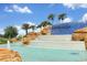 Cascading waterfalls with the Waterleigh sign enhance the community's impressive water feature at 16527 Sea Glass St, Winter Garden, FL 34787