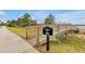 Community waterfront pier access with wood railings provides a scenic view for residents at 16527 Sea Glass St, Winter Garden, FL 34787