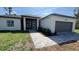 Charming single-story home boasts modern architecture, neat landscaping, and a welcoming entrance at 17380 Sw 36Th Ave Rd, Ocala, FL 34473