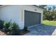 Attached two-car garage provides convenient parking and extra storage space for the home owner at 17380 Sw 36Th Ave Rd, Ocala, FL 34473