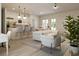 Open floor plan with lots of natural light shows a modern living room and kitchen at 17380 Sw 36Th Ave Rd, Ocala, FL 34473