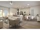 Open floor plan with lots of natural light shows a modern living room and kitchen at 17380 Sw 36Th Ave Rd, Ocala, FL 34473