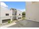 Balcony with glass railings offering views of the gray, modern home exterior at 1768 Mondrian Cir, Winter Park, FL 32789