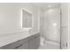 Contemporary bathroom featuring a shower with glass doors and a light gray vanity with drawers at 1768 Mondrian Cir, Winter Park, FL 32789