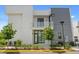 Modern home featuring a balcony, well-maintained landscaping, and contemporary architectural design at 1768 Mondrian Cir, Winter Park, FL 32789