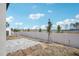Backyard with a patio, and a newly seeded yard with a privacy fence at 1801 Archer Dr, Minneola, FL 34715