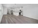 Spacious open-concept kitchen and living area featuring modern finishes and plenty of natural light at 1801 Archer Dr, Minneola, FL 34715