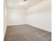 A spacious bedroom with neutral carpet, white walls, and a bright, airy ambiance at 1812 Archer Dr, Minneola, FL 34715