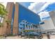 This is a shot of the exterior of a modern building with palm trees and blue skies at 1845 Delaney Ave, Orlando, FL 32806