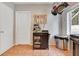 Functional coffee bar nook featuring a coffee maker, pegboard for mugs, and open storage at 1845 Delaney Ave, Orlando, FL 32806