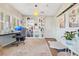 Bright and organized home office with built-in bookshelves, a desk, and ample natural light at 1845 Delaney Ave, Orlando, FL 32806