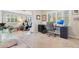 This office features natural light, a desk, and space for exercise equipment at 1845 Delaney Ave, Orlando, FL 32806