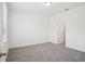 Bedroom with plush carpet, ample natural light, and neutral tones throughout at 1904 Archer Dr, Minneola, FL 34715