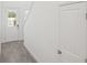 Bright foyer with tile flooring, leading to an open floor plan with a staircase and closet at 1904 Archer Dr, Minneola, FL 34715