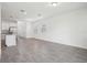 Spacious living area with tile floors, recessed lighting, and lots of natural light coming through the windows at 1904 Archer Dr, Minneola, FL 34715