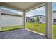 View of landscaped backyard from covered patio at 1904 Archer Dr, Minneola, FL 34715