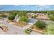 A residential street showcasing single-Gathering homes with well-kept lawns and mature trees, creating a peaceful neighborhood setting at 1993 Excalibur Dr, Orlando, FL 32822