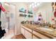 Bathroom with granite countertops and dual sinks at 1993 Excalibur Dr, Orlando, FL 32822