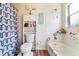 Cozy bathroom with tub and shower combination and patterned shower curtain at 1993 Excalibur Dr, Orlando, FL 32822