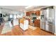 Spacious kitchen with stainless steel appliances and an island at 1993 Excalibur Dr, Orlando, FL 32822