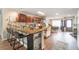 Well-lit kitchen features a breakfast bar, stainless appliances, and granite countertops at 1993 Excalibur Dr, Orlando, FL 32822