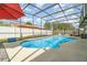 Backyard pool with lounge chairs and a privacy fence, perfect for relaxing at 1993 Excalibur Dr, Orlando, FL 32822