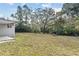 This backyard has a view of the canal, along with a fire pit at 2028 Sussex Rd, Winter Park, FL 32792