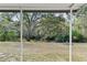 This backyard has a view of the canal from the covered patio at 2028 Sussex Rd, Winter Park, FL 32792