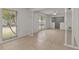Open-concept living room showcasing ceramic floors and ample natural light at 2028 Sussex Rd, Winter Park, FL 32792