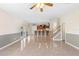 Open-concept living room and kitchen area, perfect for entertaining and relaxing at 2260 The Oaks Blvd, Kissimmee, FL 34746
