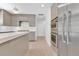 Modern kitchen featuring stainless steel appliances, sleek cabinetry, and ample counter space at 2525 Venetian Way, Winter Park, FL 32789