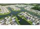 Community aerial view showcases a picturesque neighborhood with waterfront homes and lush landscaping at 2680 Nottel Dr, St Cloud, FL 34772