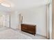 Spacious bedroom with hardwood dresser, carpet, and access to bathroom at 2680 Nottel Dr, St Cloud, FL 34772