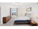 Bedroom with window and wood dressers and nightstands at 2680 Nottel Dr, St Cloud, FL 34772